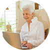 elderly woman with laptop