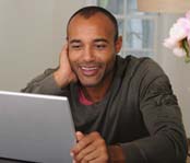 Man looking at a laptop