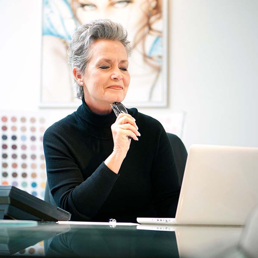 Woman on a laptop in an office