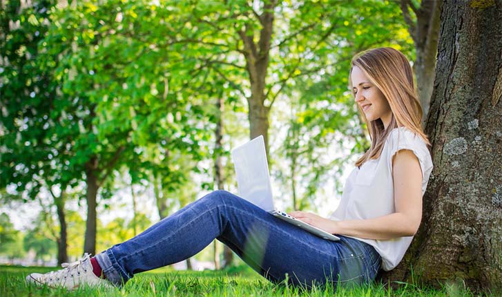 A woman using Laptop