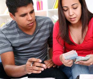 couple reviewing receipt