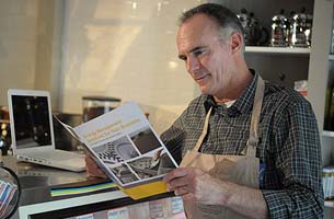 business man looking at brochure