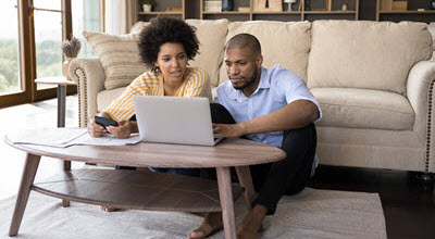 couple looking at laptop